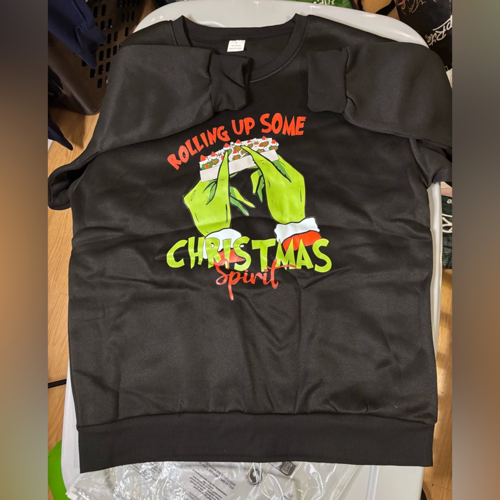 Women’s Christmas sweater “Rolling up some Christmas spirit “ never worn NWT
